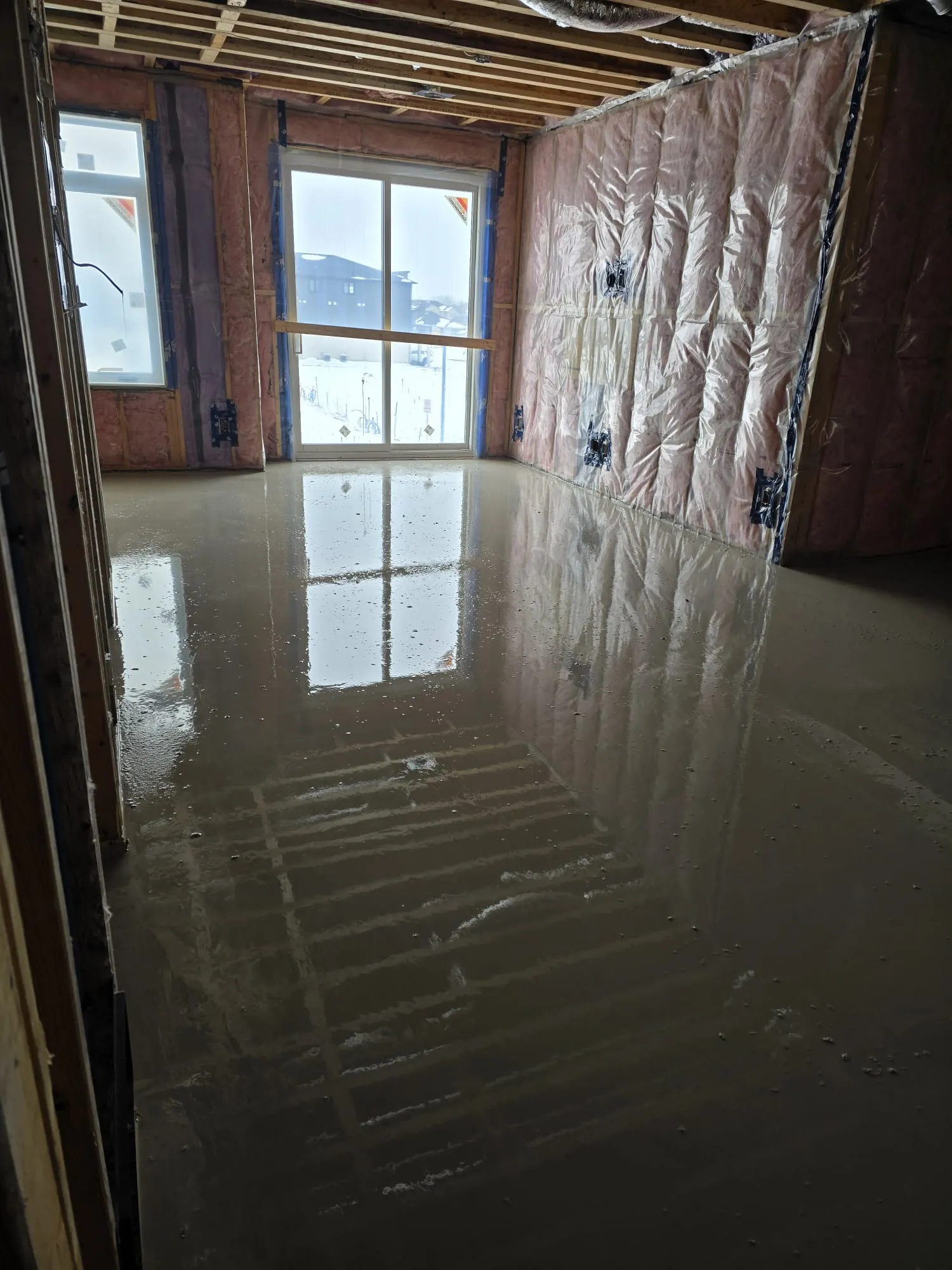 Freshly poured self-leveling floor, representing the Rideau Street project